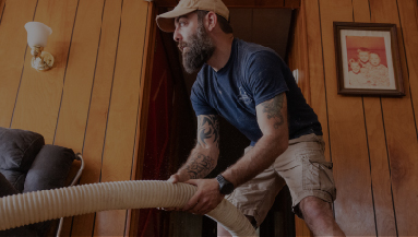 An individual installing insulation